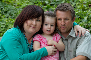 Rachel Jones with her partner David Whitaker and their daughter Mia, 2. Rachel is dying of cancer and wants to raise awareness of sun protection. Photo / Brett Phibbs
