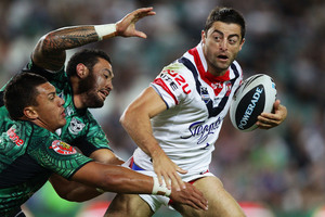Roosters Anthony Minichiello cuts through the Warriors defence. Photo / Getty Images