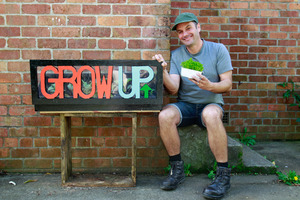 Justin Newcombe with a cold box, used to keep sprouting plants warm. Photo / NZ Herald