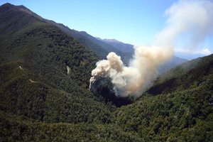 Smoke billows from the ventilation shaft after the fourth explosion in the Pike River coal mine. Photo / NZPA