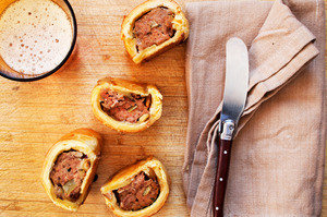 Oregano, garlic and mustard sausage rolls. Photo / Babiche Martens