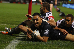 Krisnan Inu of the Warriors celebrates after scoring a try during the round 26 NRL match. Photo / Getty Images