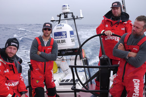Adam Minoprio, Daryl Wislang, Tony Rae, Chris Nicholson onboard CAMPER with Emirates Team New Zealand. Photo / Hamish Hooper