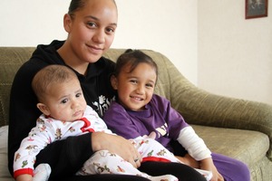 Raewyn Abraham with Rehutai, 3, and baby Rewi, who was an emergency delivery. Photo / Sue Ferens