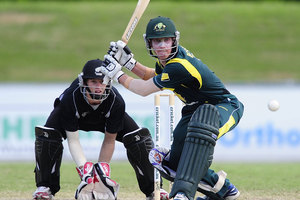William Bosisto of Australia bats in front of Cameron Fletcher of New Zealand during the match between Australia and New Zealand. Photo / Getty Images.