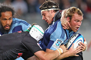 Luke Braid of the Blues is tackled. Photo / Getty Images