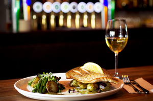 Market fish with new potatoes, green beans and salsa verde. Photo / Natalie Slade