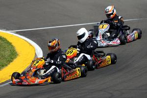 Class winner Daniel Kinsman leads Fraser Hart and Daniel Connor at Palmerston North. Photo / Fast Company/Hagen Hopkins