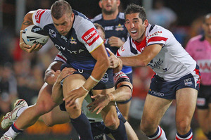 Ashton Sims of the Cowboys is tackled. Photo / Getty Images