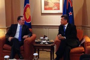 John Key Meeting ASEAN Secretary-General Surin Pitsuwan. Mr Key's relaxed style has been appreciated on this trip to Indonesia. Photo / Twitpic @johnkeypm