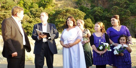 Paula Bennett toned down her attire for her wedding on Saturday at Piha beach. The groom is believed to be Alan Philps. Photo / Supplied