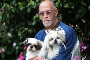 Breeder Paul Henry with two of his dogs, Kisses and Dora.
Photo / Doug Sherring