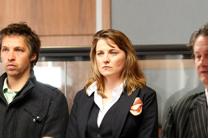 Actor Lucy Lawless in the dock with fellow Greenpeace activists today. Photo / Mark Mitchell