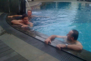 Patrick Gower (left) and John Key in a pool in Indonesia. Photo / Jared Mason