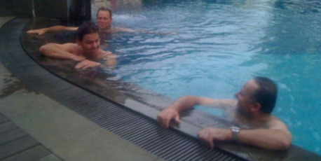 Patrick Gower (left) and John Key in a pool in Indonesia. Photo / Jared Mason