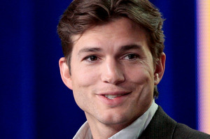 Ashton Kutcher and Mila Kunis are 'so not dating!'. Photo / AP