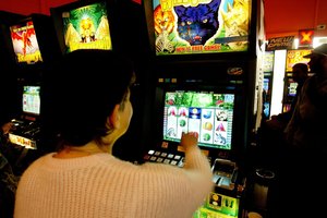 Pokie machine may come with risks. Photo / Martin Sykes