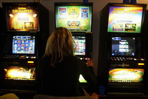 SkyCity wants to install 350-500 more poker machines as part of a deal to build a $350 million convention centre next to the casino. Photo / APN