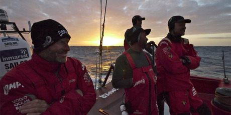 A gathering at sunset aboard Camper. Photo / Hamish Hooper