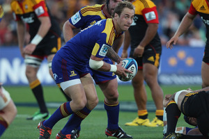 Jimmy Cowan of the Highlanders looks to pass. Photo / Getty Images.