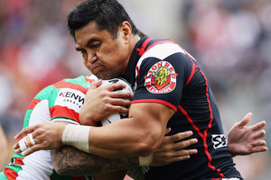 Jerome Ropati of the Warriors is hit hard during the round seven NRL match between the New Zealand Warriors and the South Sydney Rabbitohs at Mt Smart Stadium. Photo / Getty Images.