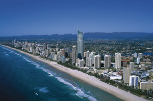 If the waves rolling into Surfers Paradise Beach are too tame there's always crocodile feeding and adventure rides to get the adrenaline going. Photo / Tourism Queensland