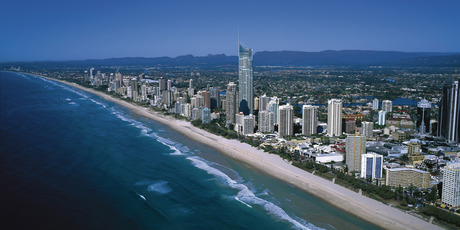 If the waves rolling into Surfers Paradise Beach are too tame there's always crocodile feeding and adventure rides to get the adrenaline going. Photo / Tourism Queensland