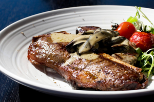 T-Bone steak with mushroom sauce. Photo / Richard Robinson