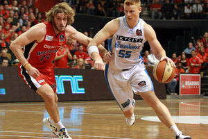 Gary Wilkinson of the Breakers looks to drive past Jesse Wagstaff of the Wildcats during game two of the NBL Grand Final series. Photo / Getty Images