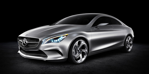 The coupe has sinewy lines, striking indicators and a centre console flowing from the instrument panel. Photo / Supplied