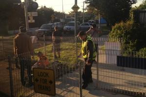 Scene of the accident between a train and cyclist near St Lukes Road in Auckland this morning. Photo / twitpic