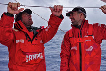 Tony Rae and Stu Bannatyne have a chat on deck onboard CAMPER with Emirates Team New Zealand. Photo / Hamish Hooper 