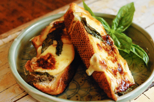 Smoked mozzarella, balsamic and basil grilled toasted sandwich. Photo / Jason Dorday