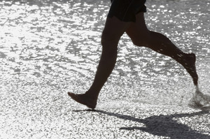 Running barefoot is an effective way to improve running technique and reduce injury says trainer, James Kuegler. Photo / Thinkstock