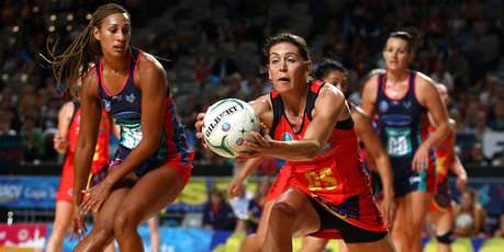 Geva Mentor of the Vixens is beaten to the ball by Irene van Dyk of the Magic during the round four ANZ Championship match. Photo / Getty Images.
