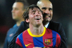 Lionel Messi and Pep Guardiola. Photo / AP
