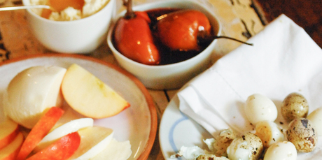 A tasting platter of quail eggs, apple with fresh mozzarella, poached tamarillo and fresh ricotta and honey. Photo / Jason Dorday