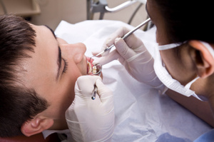 The female dentist says she tried to be professional - but the temptation to get back at her ex was just too great. Photo / Thinkstock