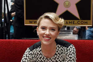 Actress Scarlett Johansson poses for photographers after receiving a star on the Hollywood Walk of Fame in Los Angeles. Photo / AP