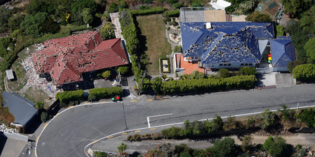 Damaged houses in Richmond Hill Road, Richmond Hill, above Sumner. Photo / Brett Phibbs