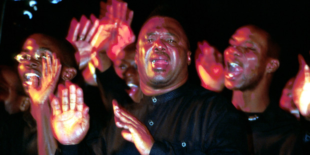 The Barbados Massed Choir soon has everyone on their feet, singing, clapping and jiving. Photo / Peter Scott