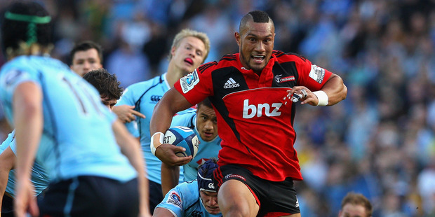Robbie Fruean of the Crusaders is tackled during the round 10 Super Rugby match between the Waratahs and the Crusaders at Allianz Stadium. Photo / Getty Images.