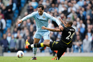 Manchester City's Joleon Lescott, left. Photo / AP