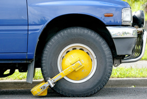 Wheel clamping is an increasingly common method of enforcement. Photo / Kenny Rodger
