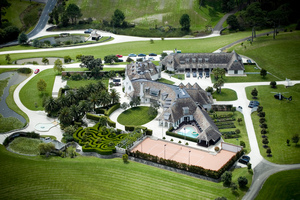 John Banks says he is unable to recall a helicopter ride to the Dotcom mansion, although helicopter log records show him as the passenger. Picture / Greg Bowker