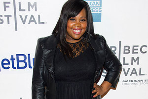 Amber Riley collapsed at a red carpet event after being overwhelmed by photographer's flashes. Photo / AP