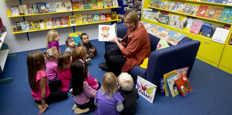 Maria at Next Page Please bookstore in Takapuna reads to a captivated audience. Photo / Sarah Ivey