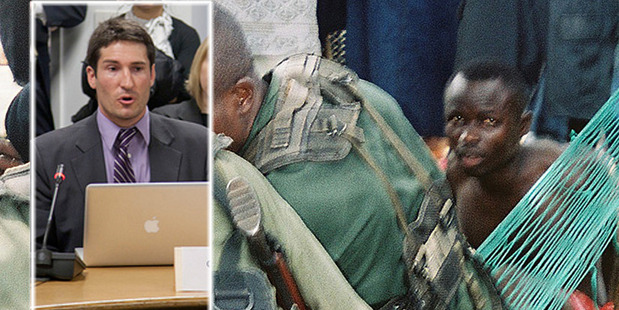 The picture Chris Mahony, inset left, took in Liberia in 2003 of soldiers with a suspected collaborator. Photo / Supplied