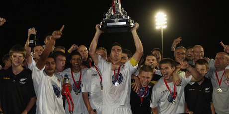 Waitakere United captain Jake Butler celebrates winning the ASB Premiership with his team. Photo / Getty Images.