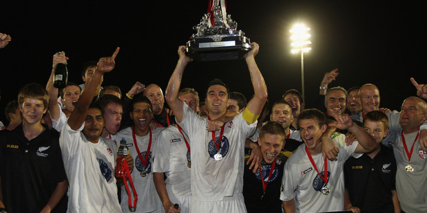 Waitakere United captain Jake Butler celebrates winning the ASB Premiership with his team. Photo / Getty Images.